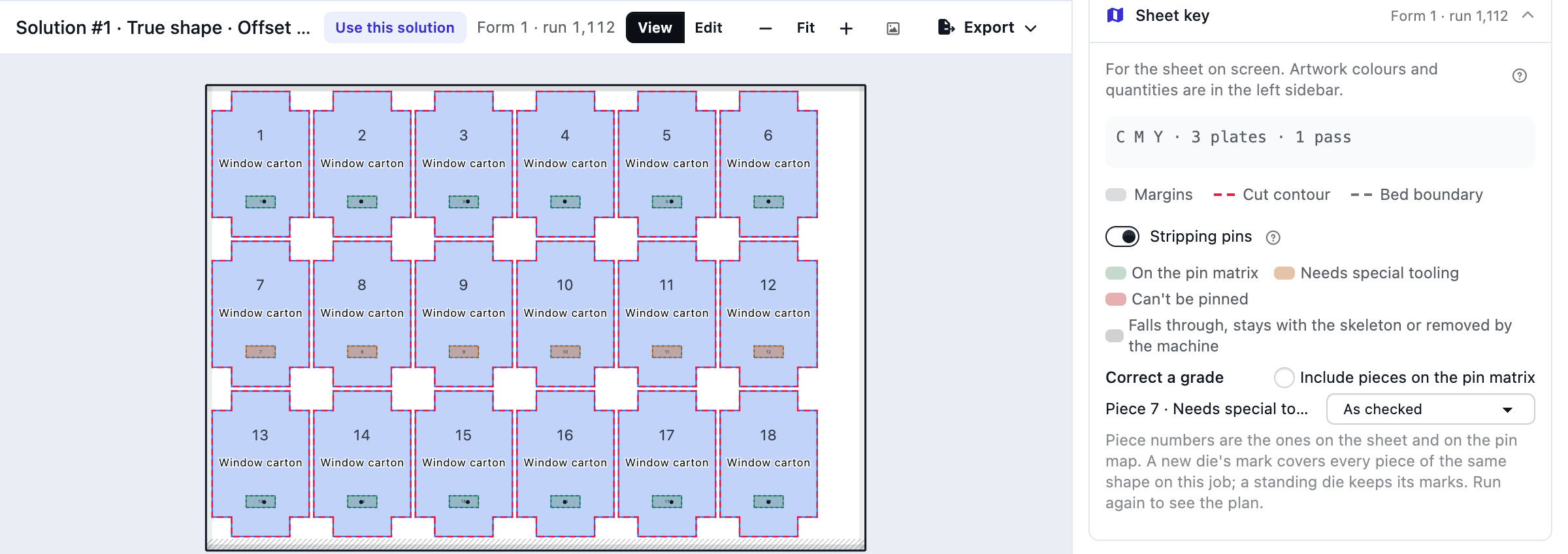 Sheet preview of an 18-up carton die with the window waste tinted by grade, stripping pins on the pieces on the pin matrix, and the Sheet key's grade swatches