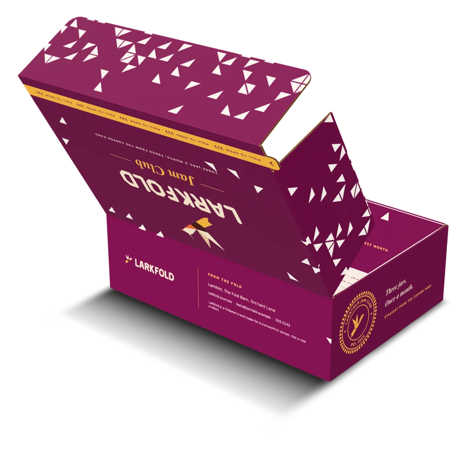 A kraft mailer with its lid open: white ink under the art outside, plum print inside