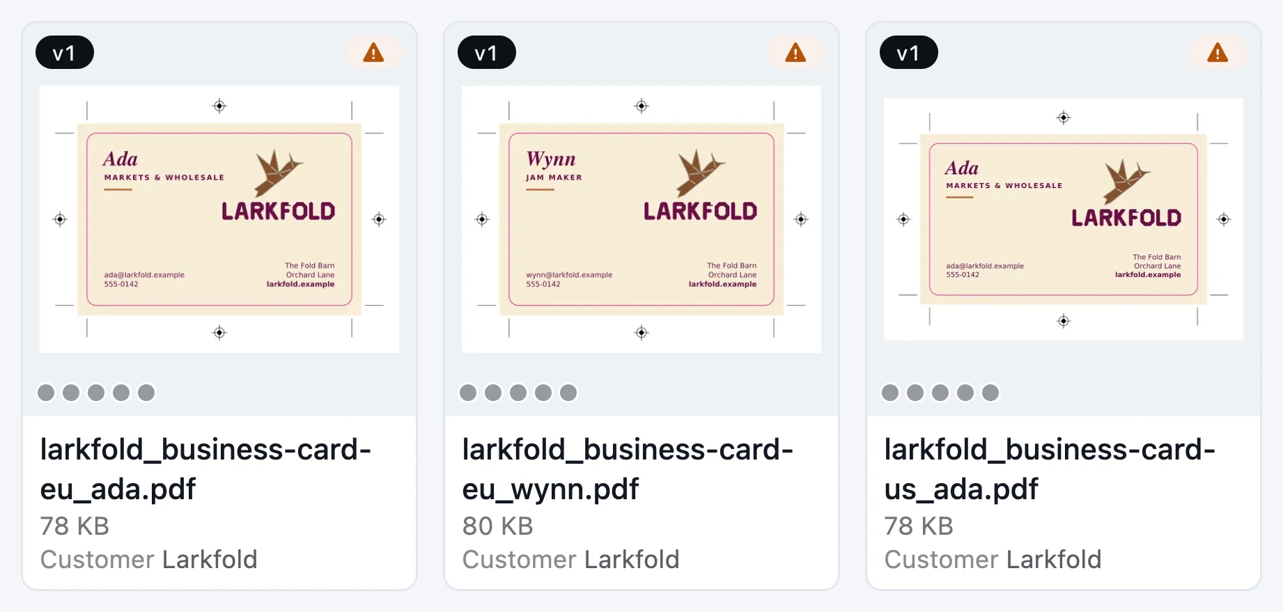 Three business card files in a grid, each card with its preflight result chip