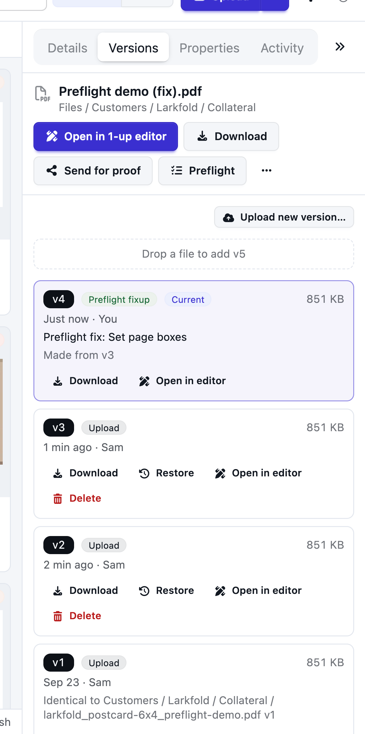 Versions of the fixed postcard in Files: v2 Preflight fixup above the original v1